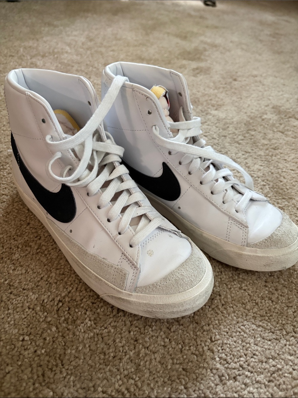Nike Women’s White High-Top Sneakers with Black Swoosh